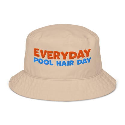Beige organic cotton bucket hat with "EVERYDAY" in orange and "POOL HAIR DAY" in blue embroidered text. Eco-friendly, breathable, and biodegradable swimmer hat.