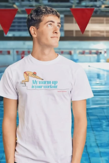 A short video of a young man, wearing swim shirt with slogan "my warm-up is your workout" on it, staying on the pool deck.