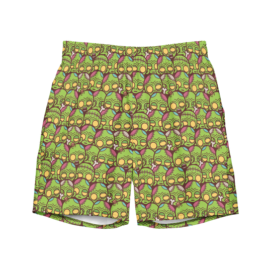 Halloween recycled swim trunks with cartoon zombie face pattern in green and purple. Eco-friendly organic swim trunks made from 100% recycled polyester.