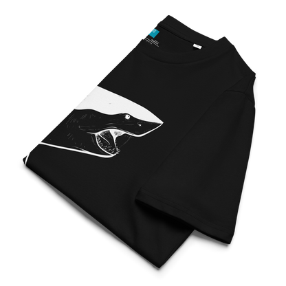 Black folded organic cotton t-shirt with a bold white shark graphic and vertical “Swim Mom” text—perfect for fierce, eco-conscious swim moms.