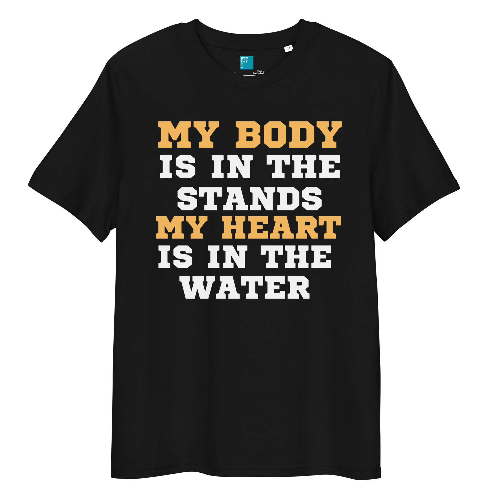 Black organic cotton swim mom t-shirt with bold text: “My Body Is in the Stands, My Heart Is in the Water,” displayed on transparent background