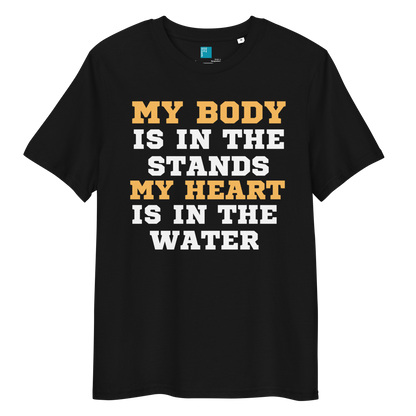 Black organic cotton swim mom t-shirt with bold text: “My Body Is in the Stands, My Heart Is in the Water,” displayed on transparent background