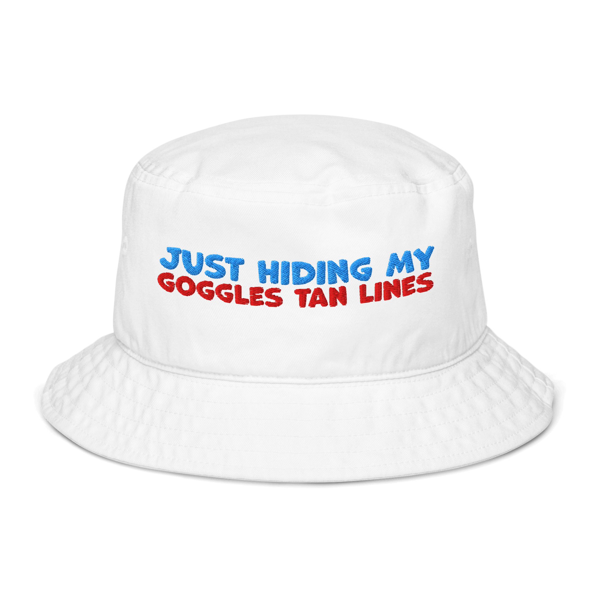 White organic bucket hat with blue and red embroidery reading “Just Hiding My Goggles Tan Lines.” Eco-friendly, breathable, and biodegradable swimmer hat.