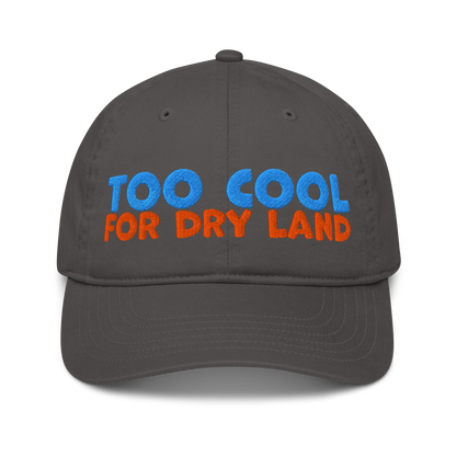 Charcoal organic cotton baseball cap embroidered with “Too Cool for Dry Land” in bold blue and orange text. Eco-friendly, breathable, and biodegradable.