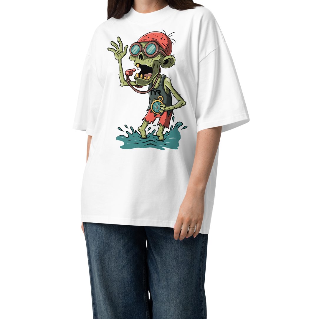 Model wearing an organic oversized t-shirt featuring a cartoon zombie swimmer for Halloween.