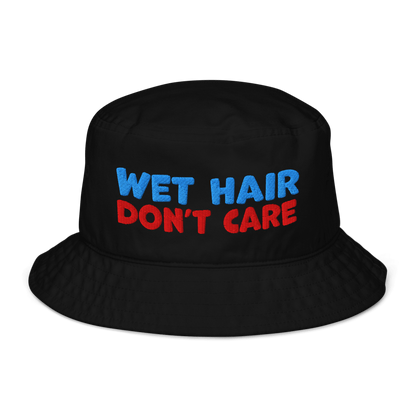 Black organic cotton bucket hat with "WET HAIR" in blue and "DON'T CARE" in red embroidered text.
